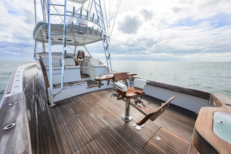 Slide: The Image of Luxurious 2014 Release Boatworks 46 yacht with wooden deck and ocean view. - 19