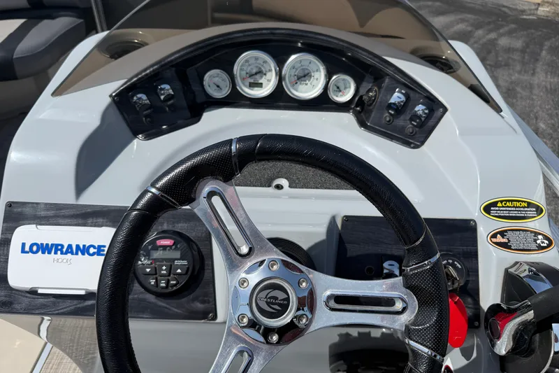 Slide: The Image of Dashboard of 2019 Crestliner 200 Rally DX CWDH with steering wheel and Lowrance Hook5 system. - 8