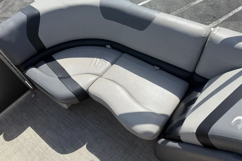 Slide: The Image of 2019 Crestliner 200 Rally DX CWDH boat seating, gray upholstery with black accents. - 16