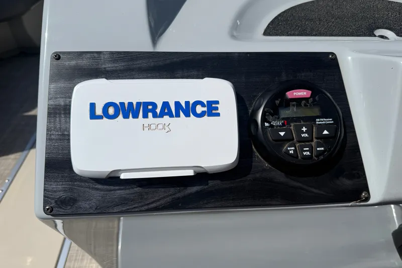 Slide: The Image of Control panel of 2019 Crestliner 200 Rally DX CWDH with Lowrance Hook and audio system. - 9