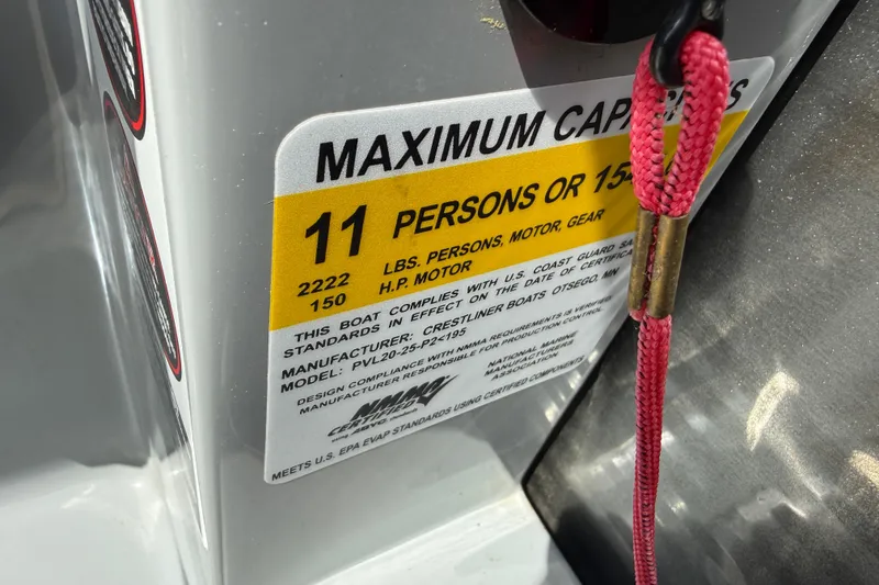 Slide: The Image of Capacity label on 2019 Crestliner 200 Rally DX CWDH, showing limits for persons and weight. - 10