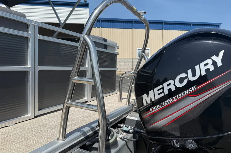 Slide: The Image of 2019 Crestliner 200 Rally DX CWDH with Mercury FourStroke engine, docked outdoors. - 22