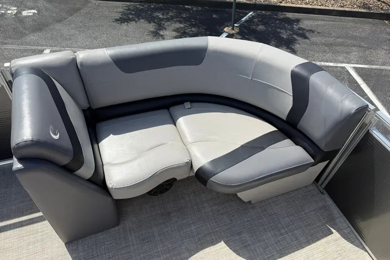 Slide: The Image of 2019 Crestliner 200 Rally DX CWDH boat seating, featuring gray and black cushioned upholstery. - 14