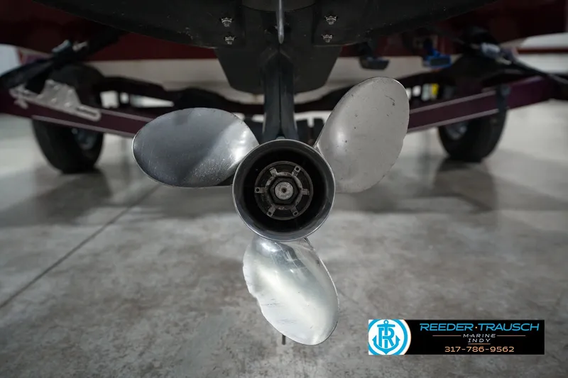 Slide: The Image of Propeller of a 1998 Nitro 700 LX SC boat on a trailer in a garage. - 50
