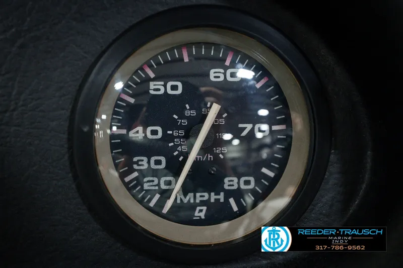 Slide: The Image of Speedometer of a 1998 Nitro 700 LX SC boat, displaying MPH and km/h. - 36