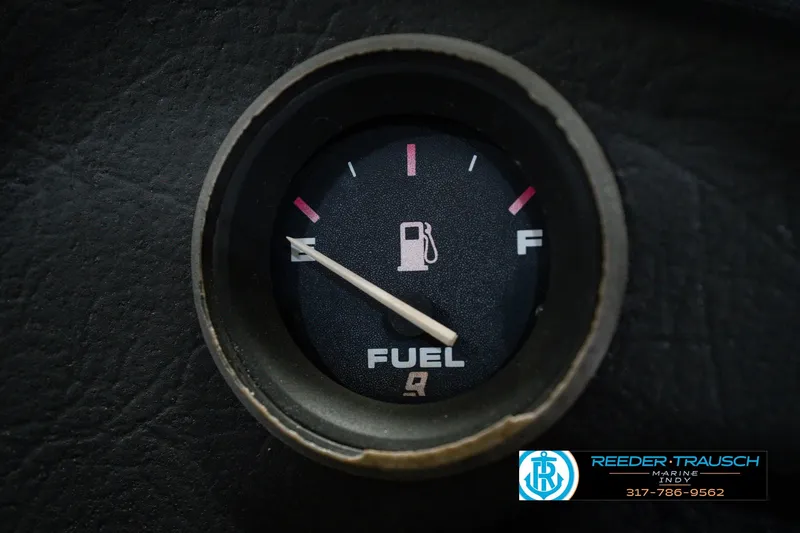 Slide: The Image of Fuel gauge of a 1998 Nitro 700 LX SC boat, showing near empty. - 34