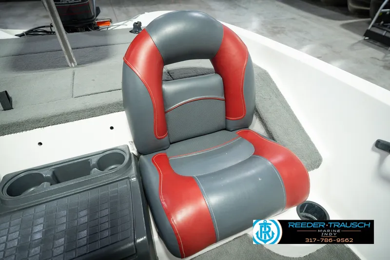 Slide: The Image of Red and gray seat in a 1998 Nitro 700 LX SC boat interior. - 42