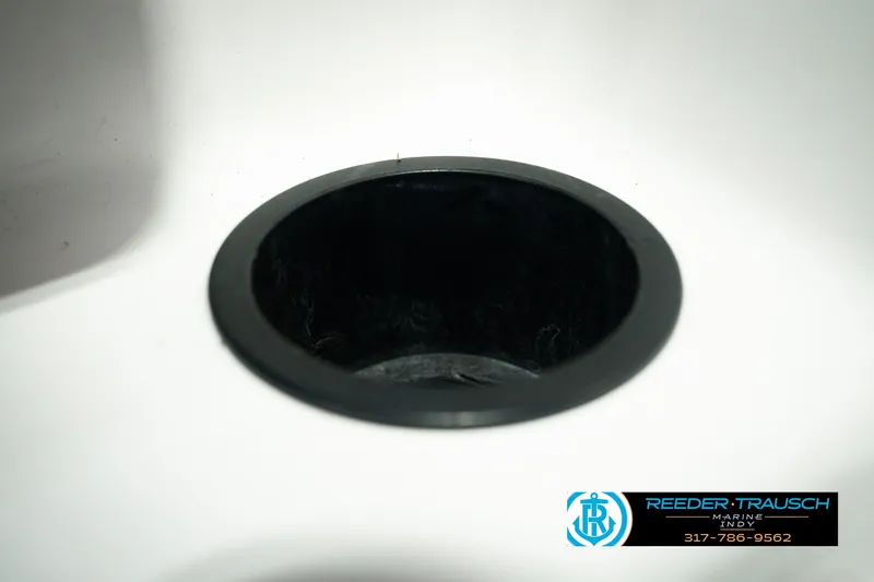 Slide: The Image of Cup holder on a 1998 Nitro 700 LX SC boat, Reeder Trausch Marine logo visible. - 44