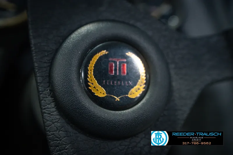 Slide: The Image of Close-up of a 1998 Nitro 700 LX SC steering wheel with Teleflex logo. - 32