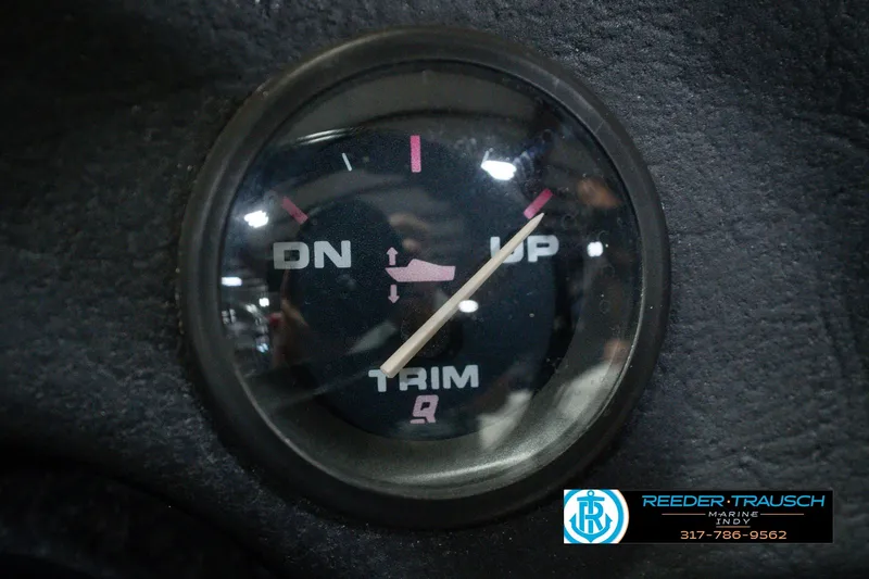 Slide: The Image of Trim gauge of a 1998 Nitro 700 LX SC boat, showing "UP" and "DN" indicators. - 37
