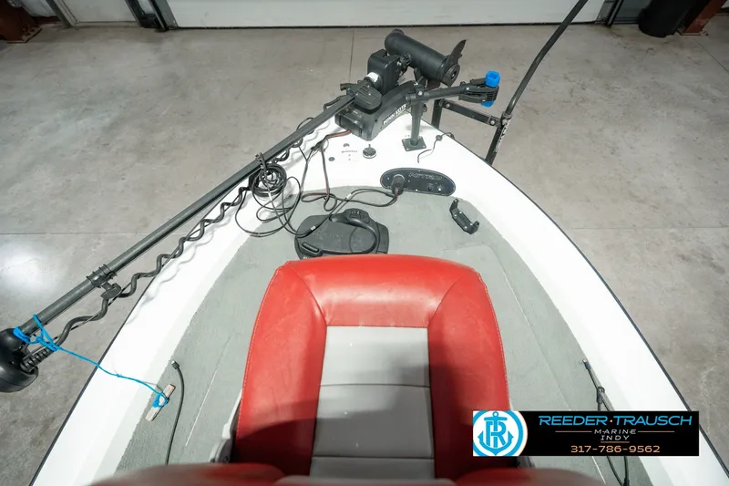 Slide: The Image of 1998 Nitro 700 LX SC boat interior with red seat and fishing equipment. - 20