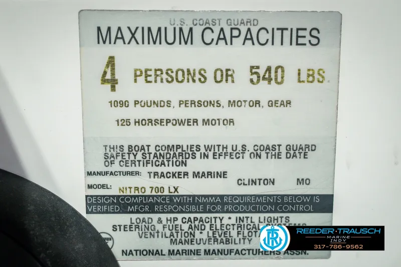 Slide: The Image of 1998 Nitro 700 LX SC boat capacity label, 4 persons, 540 lbs, 125 horsepower motor. - 62