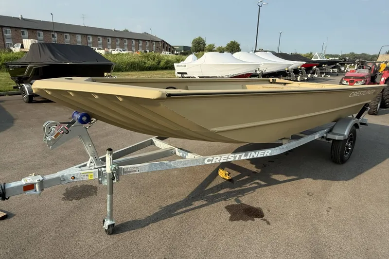The Image of 2026 Crestliner 1760 Retriever Jon boat on trailer, parked outdoors. - 0
