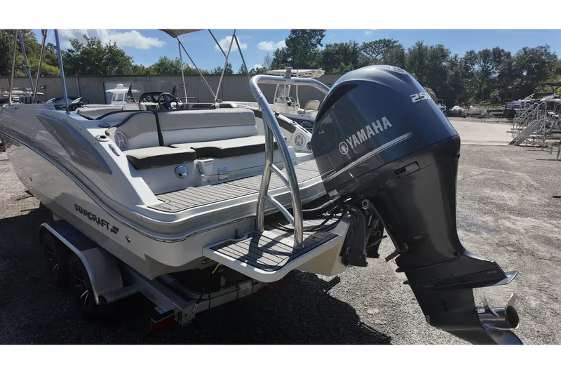 Slide: The Image of 2017 Starcraft Crossover 231 SCX OB boat with Yamaha outboard motor on trailer. - 11