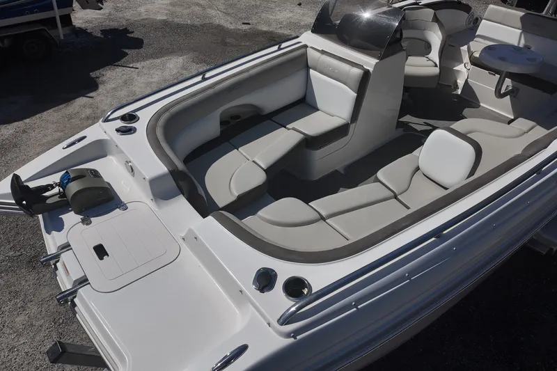 Slide: The Image of 2017 Starcraft Crossover 231 SCX OB boat interior with spacious seating and modern design. - 7