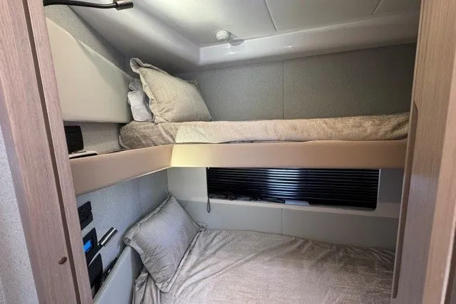 Slide: The Image of 2023 Azimut Fly 50 yacht interior with cozy bunk beds and modern design. - 31