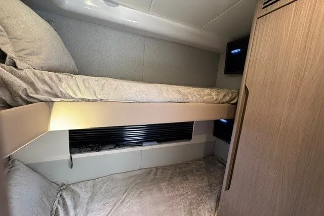 Slide: The Image of 2023 Azimut Fly 50 yacht interior with cozy bunk beds and modern design. - 30