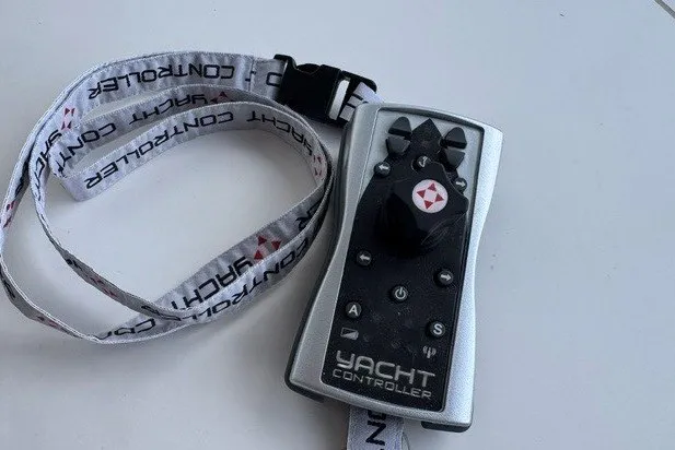 Slide: The Image of Remote control for 2023 Azimut Fly 50 yacht with lanyard, labeled "Yacht Controller." - 22