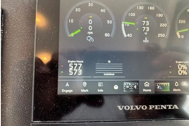 Slide: The Image of Dashboard display of a 2023 Azimut Fly 50 yacht with Volvo Penta engine metrics. - 24
