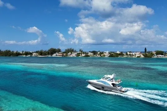 Slide: The Image of Azimut Fly 50 yacht cruising in clear turquoise waters, 2023 model. - 2