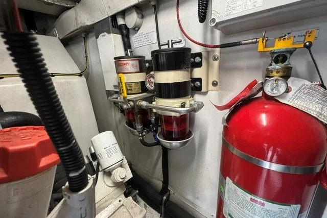 Slide: The Image of Engine room of 2023 Azimut Fly 50 yacht with fire extinguisher and fuel filters. - 46
