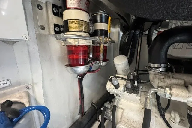 Slide: The Image of Engine room of 2023 Azimut Fly 50 yacht showing fuel filters and engine components. - 47