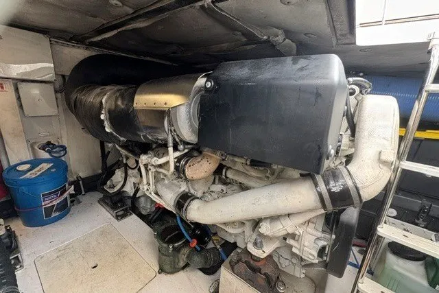 Slide: The Image of Engine room of 2023 Azimut Fly 50 yacht, showcasing powerful marine engine components. - 44