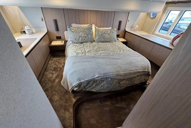 Slide: The Image of Luxurious bedroom interior of 2023 Azimut Fly 50 yacht with elegant bedding and modern design. - 32