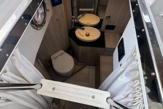 Slide: The Image of Luxurious bathroom interior of 2023 Azimut Fly 50 yacht with modern fixtures. - 9