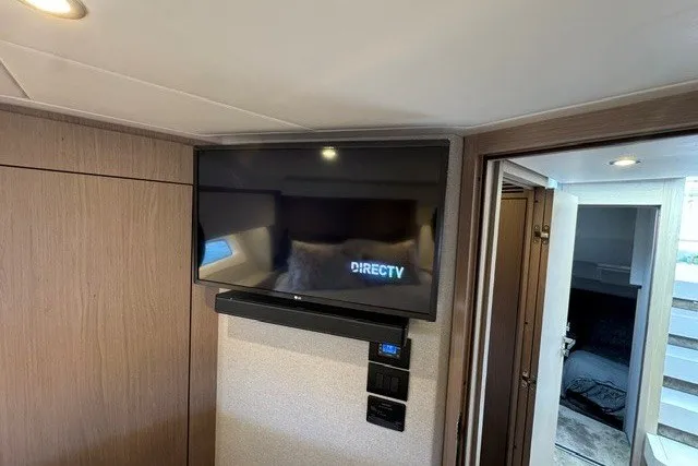 Slide: The Image of Flat-screen TV in 2023 Azimut Fly 50 yacht interior, displaying DirecTV. - 27