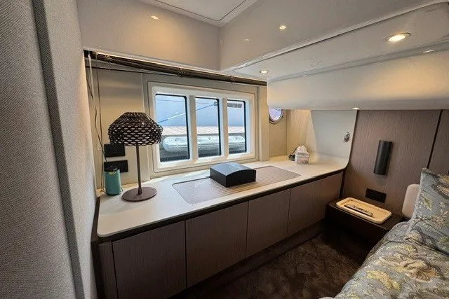 Slide: The Image of Luxurious interior of 2023 Azimut Fly 50 yacht with modern decor and window view. - 33