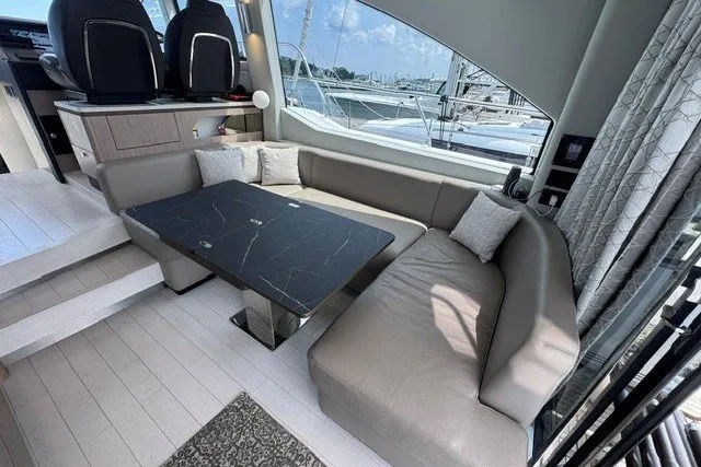 Slide: The Image of Luxurious interior of 2023 Azimut Fly 50 yacht with elegant seating and modern design. - 14