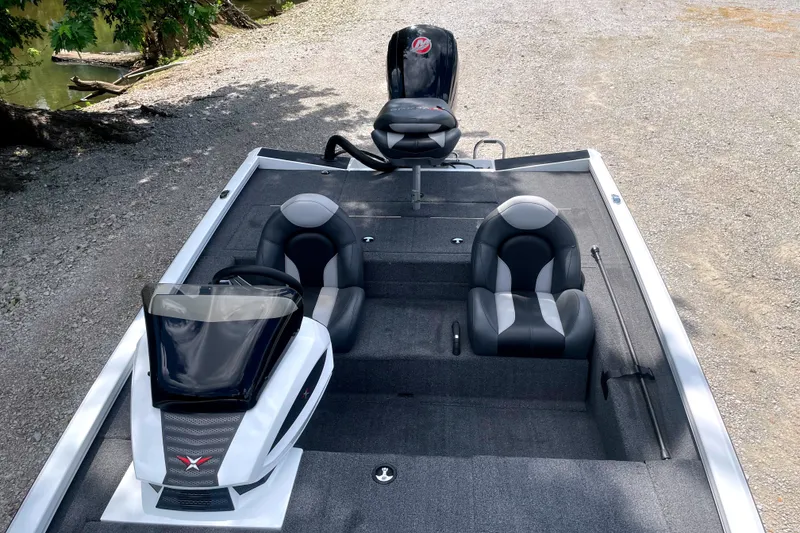 Slide: The Image of The image shows a 2023 Vexus AVX189C boat with gray and black seating. - 8