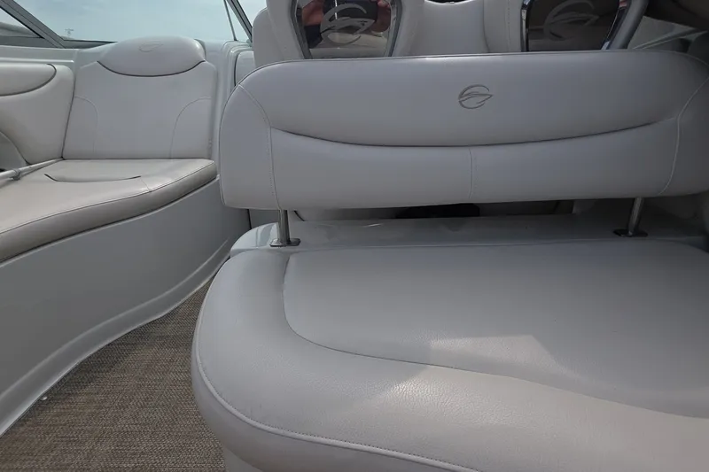 Slide: The Image of Interior of a 2017 Crownline 325 SCR boat with plush seating. - 23