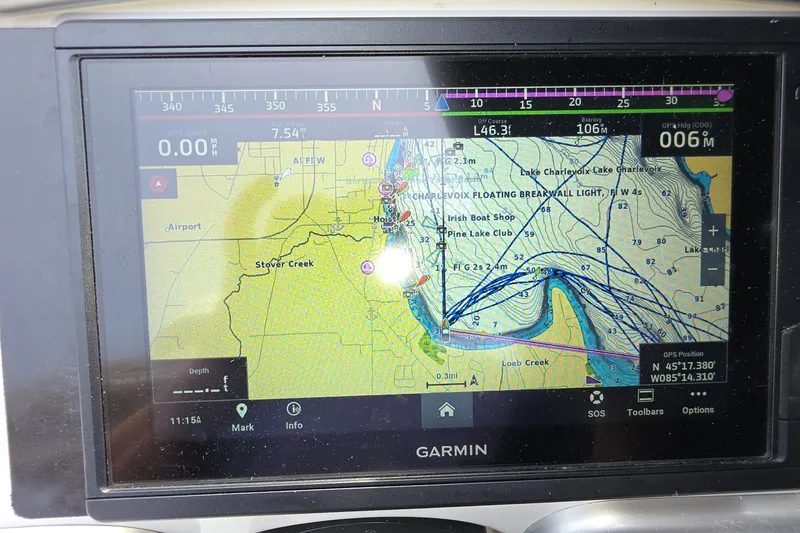Slide: The Image of Garmin GPS display on 2017 Crownline 325 SCR, showing Lake Charlevoix navigation map. - 17
