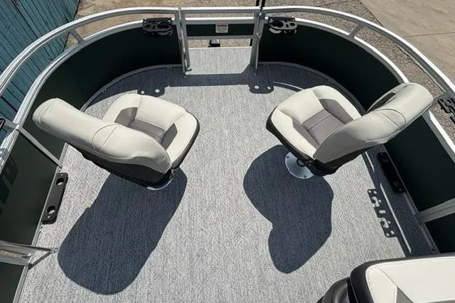 Slide: The Image of 2026 Sun Tracker Bass Buggy 16 XL Select pontoon boat with two swivel seats. - 6