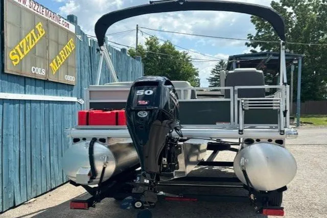 Slide: The Image of 2026 Sun Tracker Bass Buggy 16 XL Select pontoon boat with 50 HP engine. - 4