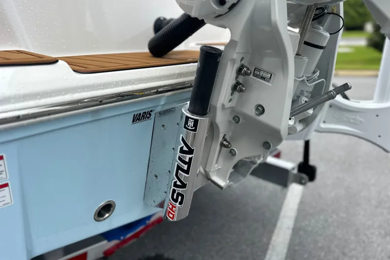 Slide: The Image of Close-up of a 2027 Pathfinder 2400 Tournament boat's engine mount and hydraulic system. - 26