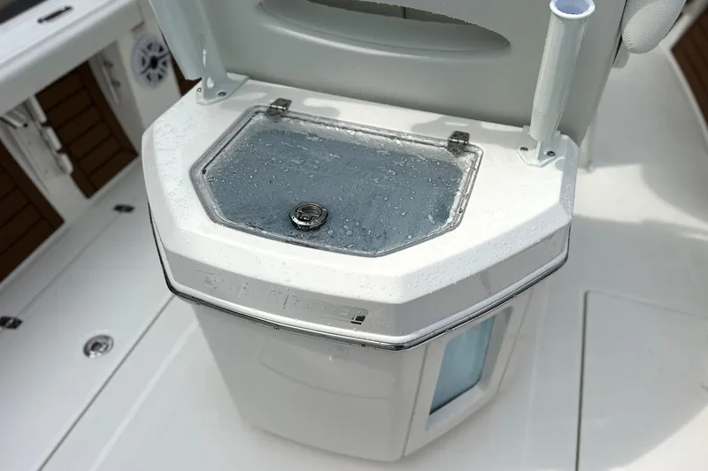 Slide: The Image of 2027 Pathfinder 2400 Tournament boat's livewell with water droplets on the lid. - 7