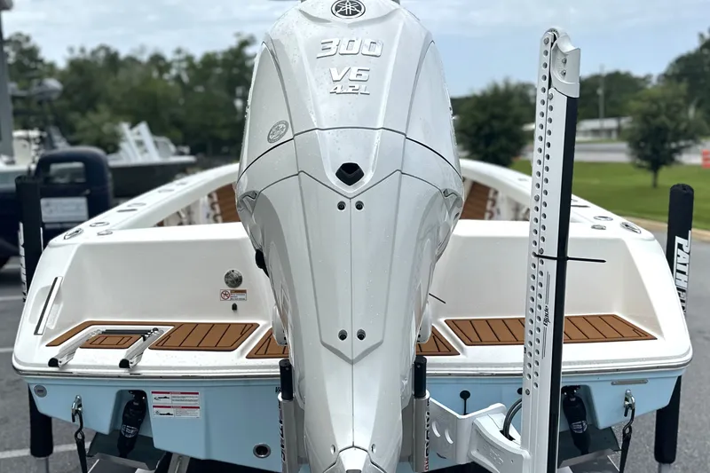 Slide: The Image of 2027 Pathfinder 2400 Tournament boat with powerful 300 V6 engine, showcased outdoors. - 30