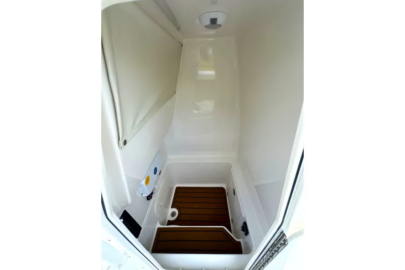 Slide: The Image of Interior of 2027 Pathfinder 2400 Tournament boat, featuring a compact, modern design. - 4