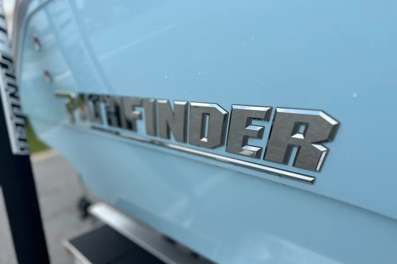 Slide: The Image of Close-up of 2027 Pathfinder 2400 Tournament logo on light blue surface. - 24