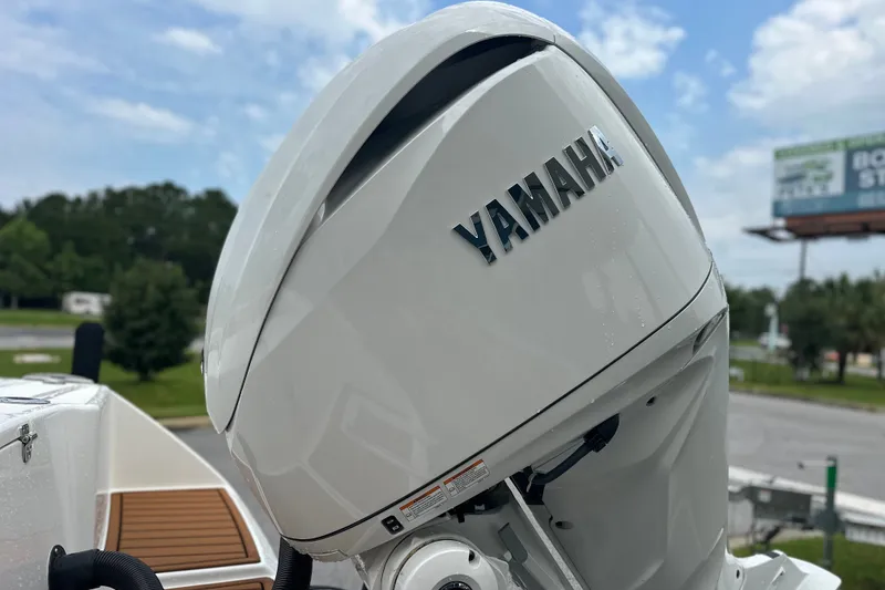 Slide: The Image of Yamaha outboard motor on a 2027 Pathfinder 2400 Tournament boat, outdoors. - 28