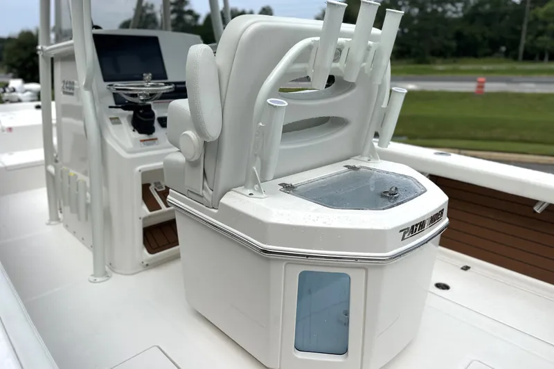 Slide: The Image of 2027 Pathfinder 2400 Tournament boat interior with helm and seating area. - 19