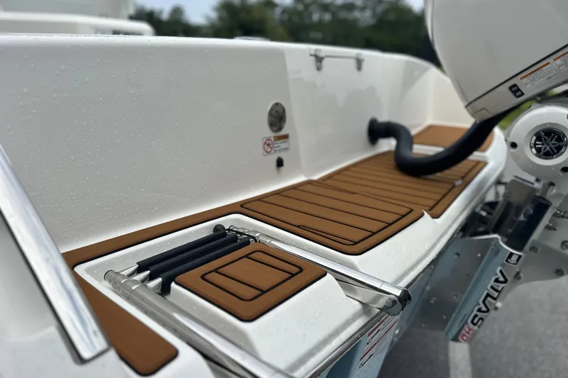 Slide: The Image of 2027 Pathfinder 2400 Tournament boat with teak deck and motor details. - 27