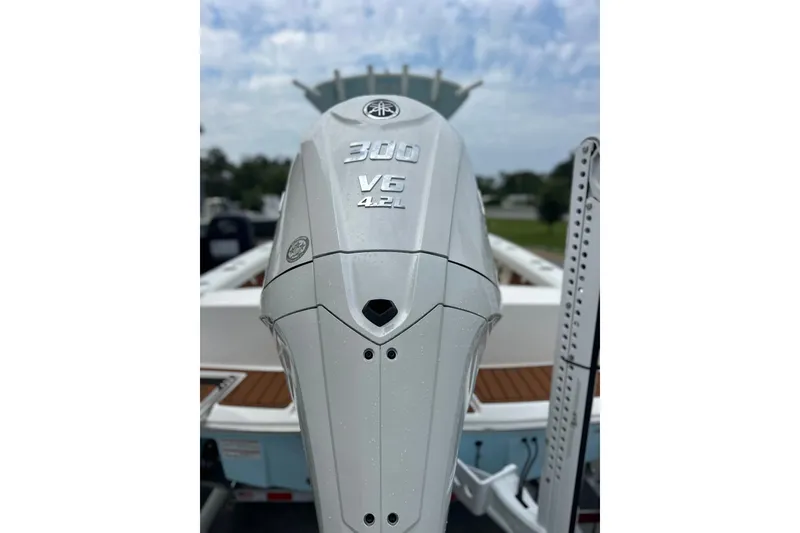 Slide: The Image of Outboard motor on 2027 Pathfinder 2400 Tournament boat, featuring 300 V6 4.2L engine. - 29