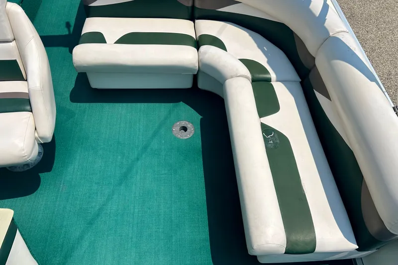Slide: The Image of 2003 Misty Harbor 2080CF boat interior with green and white seating. - 20