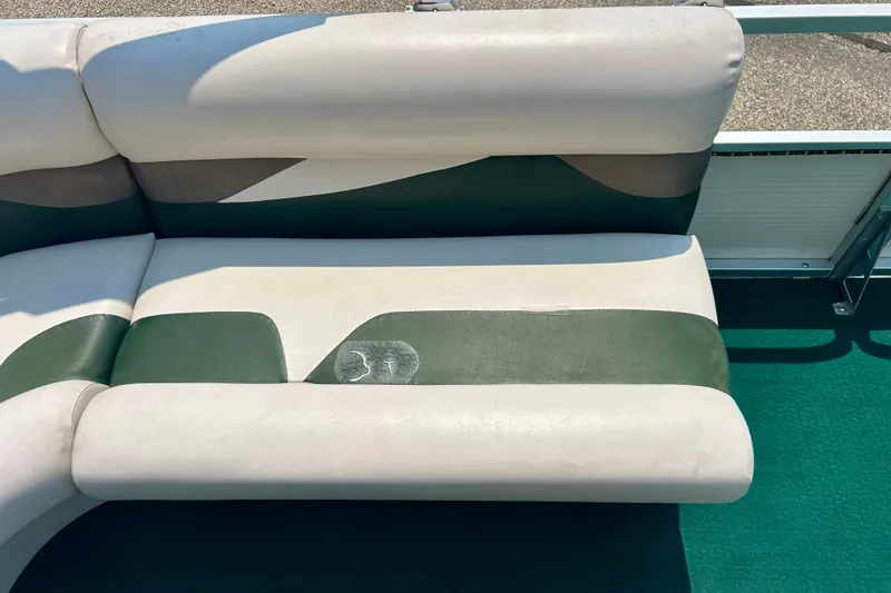 Slide: The Image of 2003 Misty Harbor 2080CF boat seat with green and white upholstery. - 28