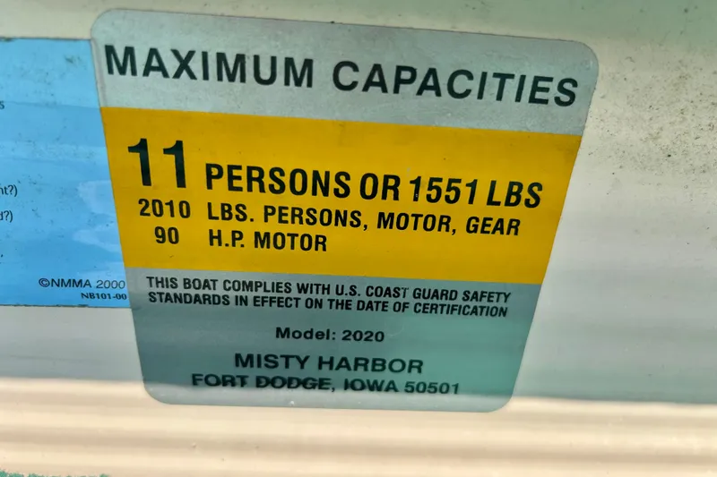 Slide: The Image of Maximum capacity label for Misty Harbor 2080CF boat, 11 persons or 1551 lbs. - 25