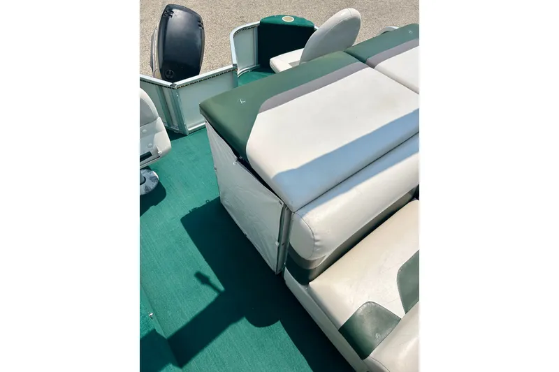 Slide: The Image of 2003 Misty Harbor 2080CF boat interior with green and white seating. - 36